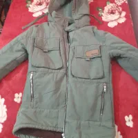 کاپشن  از برند کومار