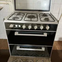 اجاق گاز پنج شعله طرح فر سالم و تمیز یک جفت فرش ۶