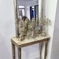 اینه و شمع دان و ساعت