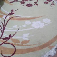 یک فرش گرد و یه کناره ۴ متری