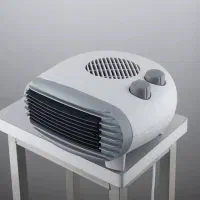بخاری رومیزی فن دار
