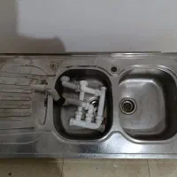 یک عدد.سینک استیل..و یک عدد هود بیمکث 2 موتوره نو