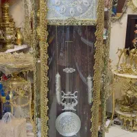 ساعت،ویترین،میز تلویزیون .برنجی.