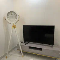 میز ال سی دی ساعت جلو مبلی