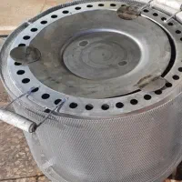 تنور‌ گازی‌ برای‌ پخت‌نان‌‌ و یک‌ فلاسک