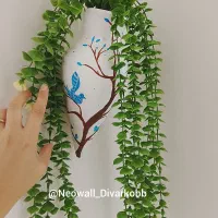 دیوارکوب و ظروف سفالی تزئینی