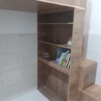 تخت به همراه کمد و کتابخانه