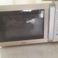 مایکروفر ۳۲ لیتری اصل درحد نو
