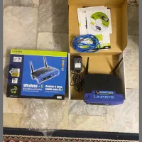 روترلینکسیس+اداپتورLinksys+کارت شبکه+باطری+دیسکت