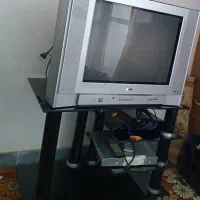 تلوزیون ال جی رنگی کاملا سالم با میز تلوزیون