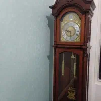 ساعت ایستاده .چوبی