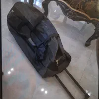 ساک برزنتی چرخ دار و دسته دار