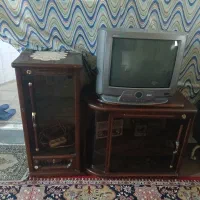 تلویزیون. اسپیکر. ساعت. بوفه. ضبط وبابد