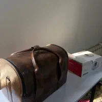 وسایل ناخنکاری با کیف چرم و یووی با سوهان برقی