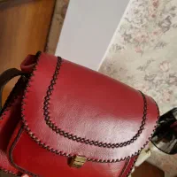 کیف چرم گاوی زرشکی. کار دست