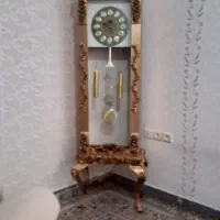 ساعت ایستاده طلایی