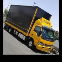 کارگر حمل نقل باربری با کامیون بزرگ