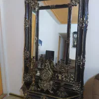 آینه و کنسول وساعت وشمعدان