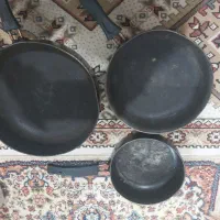 ماهی تابه و قاشق و چنگال باغی