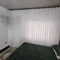 نیروی همکار برای نصب پرده