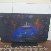 وسایل خانه شامل تلویزیون و میز وبوفه ومبل وجلو مبل