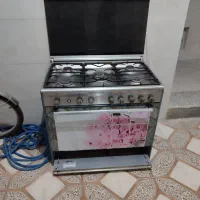 اجاق گاز ۵شعله دارای فر و جوجه گردان در حد نو