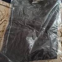 پیراهن کرم و شلوار قهوه ای نو میباشد