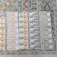 اسکناس 100 و 50 تومانی و مقداری سکه قدیمی