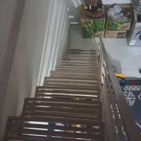 پله اهنی داخل خانه