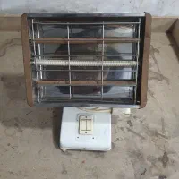 بخاری برقی قدیمی سه شعله