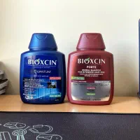 شامپو bioxin ترک آبی و قرمز