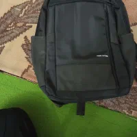 کیف مدرسه|کیف، کفش، کمربند|شیراز, لب آب|دیوار