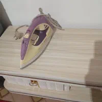 اتو میز تلویزیون چرخ گوشت