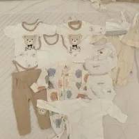 ۱۳ تکه لباس نو نوزاد سایزهای ۳ تا ۶ ماه