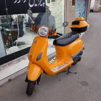 موتور وسپا عروسک جاده