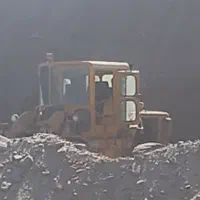 راننده لودر ۹۵۰ کاترپلار