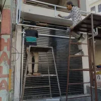 تعمیردرشیشه ای اتومات.کرکره برقی.جک پارکینگ.درریلی