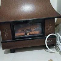 بخاری گازی شومینه یی نیک کالا