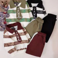 پوشاک کودک|کفش و لباس بچه|قم, قلعه کامکار|دیوار