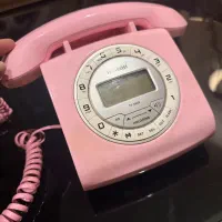 تلفن باسیم صورتی رنگ کاملا سالم