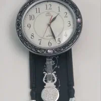 گلدان وساعت