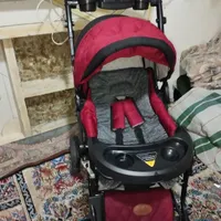 یه عدد کالسکه بچه