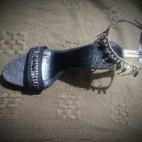 کفش مجلسی|کیف، کفش، کمربند|شیراز, لب آب|دیوار