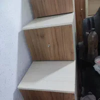 تختخواب دو طبقه پر از کشو طبقات و کمد بزرگ