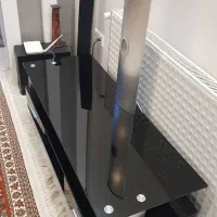 میز شیشه ای تلویزیون