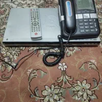 یک عدد تلفن ثابت ویک دستگاه سی دی