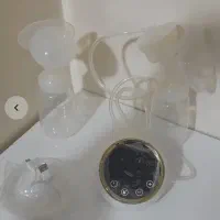 شیردوش برقی و دستی