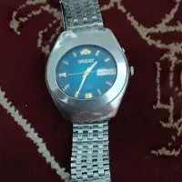 ساعت اتومات اورینت وسنگ خون اصل