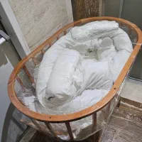 تخت نوزاد مدل بیضی گهواره شو