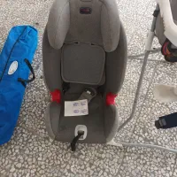 صندلی ماشین کودک و ننو بچه و میز غذاخوری بچه